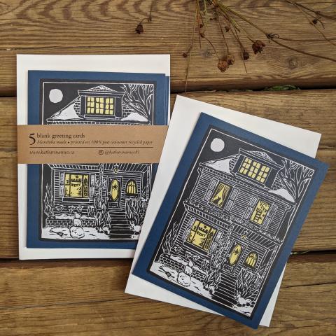 Package of 5 cards showing the outside of a house at Christmastime, at night.