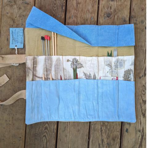 naturally dyed knitting needle roll opened up to show the inside